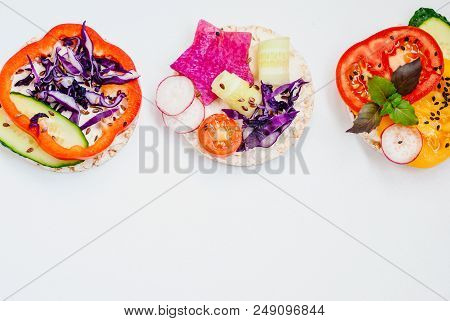 Open Sandwiches Of Rice Cakes With Cream Cheese , Vegetables, Healthy Breakfast