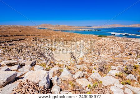 Ancient Ruins In The Island Of Delos In Cyclades, One Of The Most Important Mythological, Historical