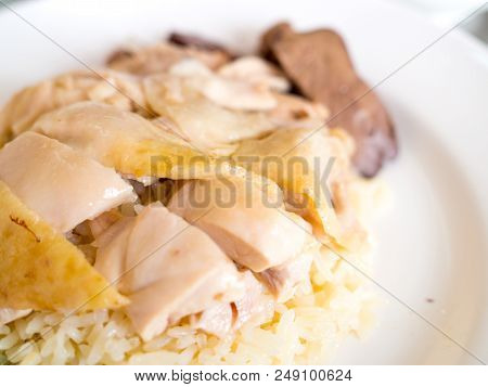Close Up Hainanese Chicken Rice With Cucumber On A Plate