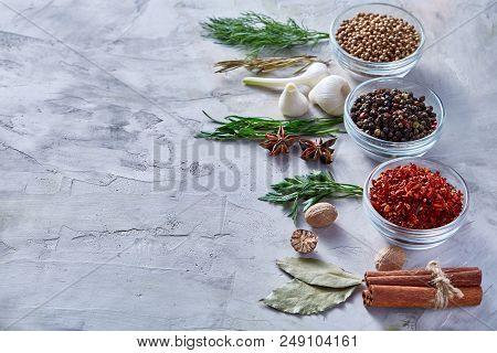 Three Glass Bowls With Spices Arranged In Rows On White Textured Background, View From Above, Select