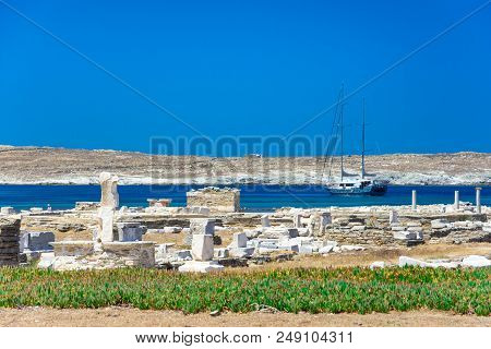 Ancient Ruins In The Island Of Delos In Cyclades, One Of The Most Important Mythological, Historical