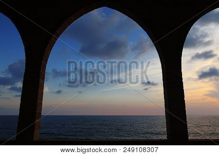 View Of The Mediterranean Sea Through Arches In Batroun, Lebanon.