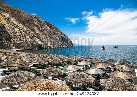 Permissa black sand beach in Santorini. Greece. 