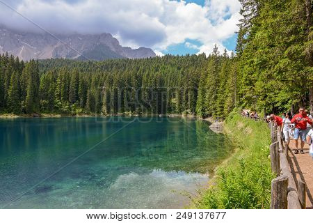 Lake Carezza With Reflection Of Mountains In The Dolomites