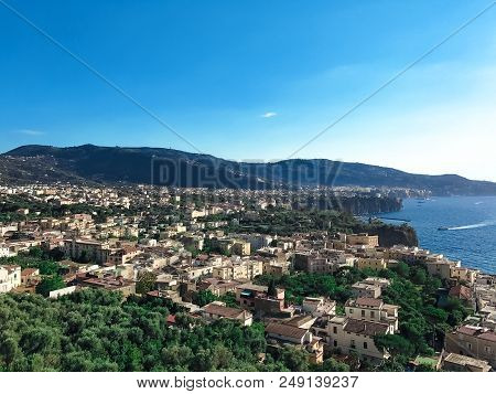 View Of The Roofs Of The Houses, The Sea And The Mountains In The Bay
