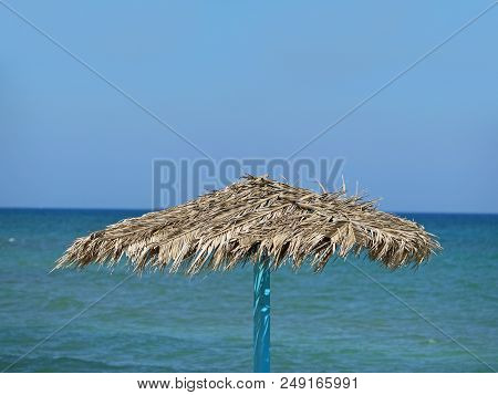 Single Umbrella Close Up With Sea View.