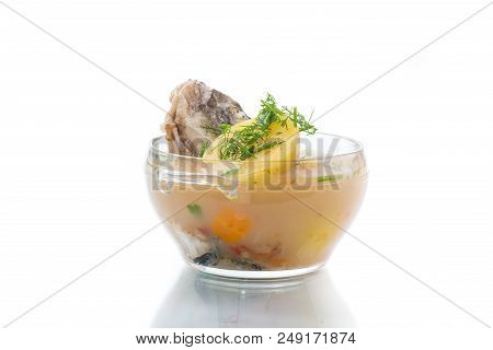 Vegetable Soup With Fish In A Glass Bowl On A White Background