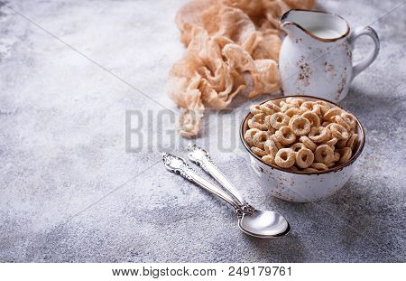 Sweet Cereal Loops In Bowl. Corn Flakes For Breakfast. Selective Focus