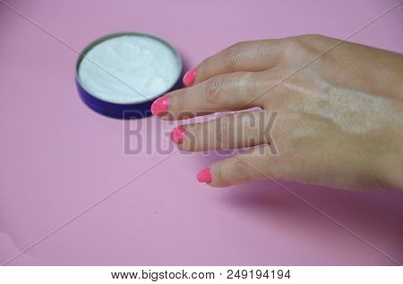 Young Woman Applying Hand Cream, Closeup. Scin Care. Beauty Treatment Concept