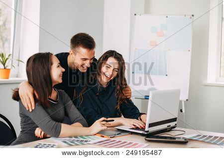 Friendly Atmosphere, Cohesive Team, Communication And Comradery. Graphic Designers Working With Colo