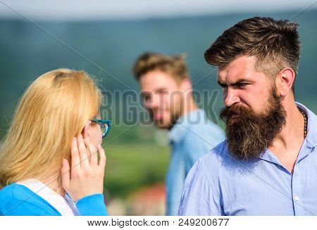 Husband Strictly Watching His Wife Looking At Another Guy While Walk. Jealous Concept. Passerby Smil