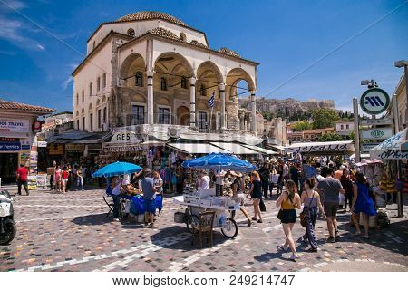ATHENS GREECE, JUN 11 2016:: Tzistarakis Mosque and metro station in Monastiraki square in the old town of Athens, Greece on Jun 11, 2016. Athens. 