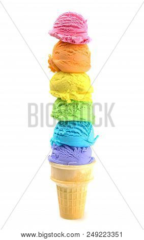 Six Large Scoops Of Rainbow Ice Cream Cone On A White Background