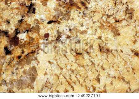 The Polished Surface Of The Yellow Granite, Called Giallo Veneziano.