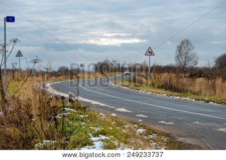 The Highway Passes Through The Autumn Field