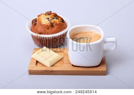Classic Espresso In White Cup With Homemade Cake And Chocolate On White Background