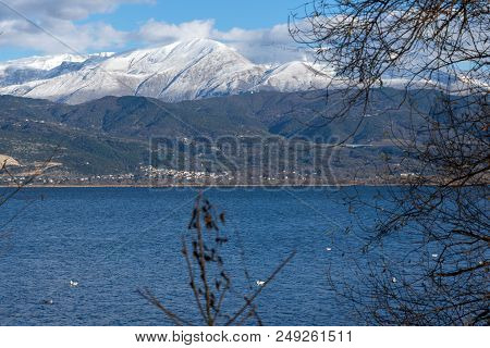 Amazing Winter Landscape Of Lake Pamvotida And Pindus Mountain From City Of Ioannina, Epirus, Greece