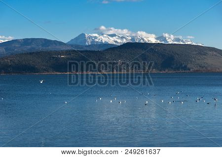 Amazing Winter Landscape Of Lake Pamvotida And Pindus Mountain From City Of Ioannina, Epirus, Greece