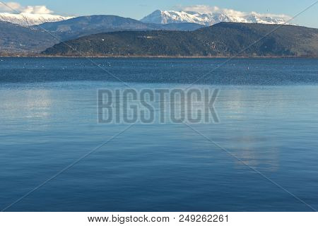 Amazing Winter Landscape Of Lake Pamvotida And Pindus Mountain From City Of Ioannina, Epirus, Greece