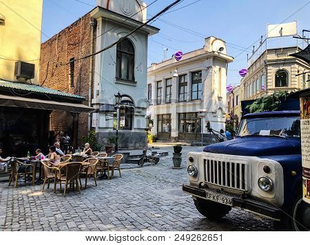 Tbilisi, Georgia - July 10, 2018: Old Town Street, Cafe In Shardeni Street. Front Of The Old Cargo C