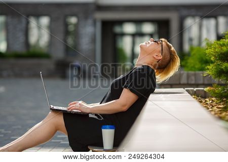 A Girl Plus Size Smiles, Joyful, Laughs, Happy On A Bright Sunny Day On The Street, A Haircut Assync