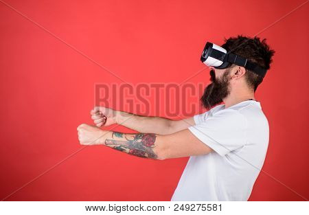 Hipster On Concentrated Face Driving Car On High Speed In Virtual Reality. Man With Beard In Vr Glas
