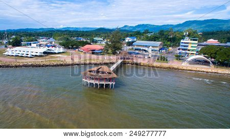 Sipitang,sabah-july 6,2018:aerial View Of The Wooden Pier Or Jetty With Hut At Esplanade In Sipitang