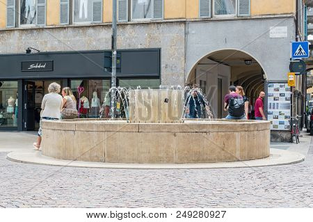 Bergamo, Italy - May 30, 2018: Water Fountain On The Crossroad Via Xx Settembre And Largo Ncolo Rezz