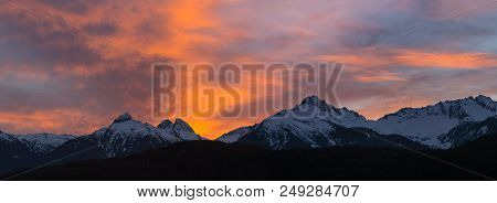 Sunset Sky Over Tantalus Range In British Columbia Canada During Winter Panorama