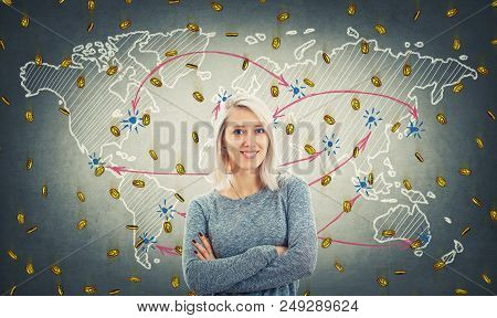 Cheerful Blonde With Blue Eyes And Crossed Hands Stand Over World Map Background And A Lot Of Golden