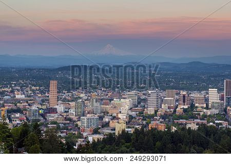 Alpenglow Over Mount Hood And Cityscape Of Downtown Portland Oregon After Sunset