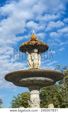 Cherubs On The Artichoke Fountain, In Retiro Park, Madrid, Spain. It Was Built In 1781, By The Archi