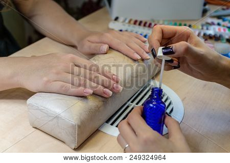 Painting Nails In Nail Salon, Uv Lap Of Quick Dry Nail Polish Manicure, Focus On Hand