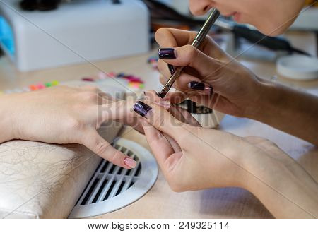 Painting Nails In Nail Salon, Uv Lap Of Quick Dry Nail Polish Manicure, Focus On Brush