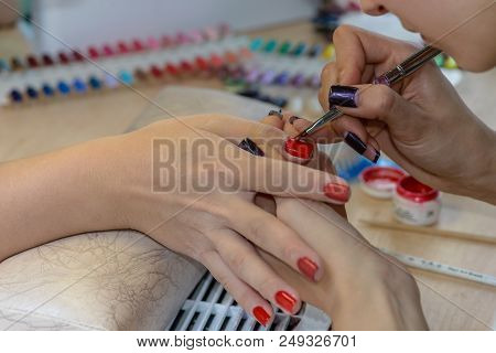 Painting Nails In Nail Salon, Uv Lap Of Quick Dry Nail Polish Manicure, Focus On Brush