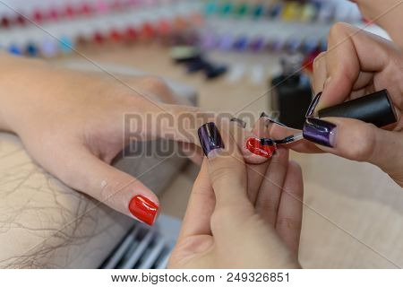 Painting Nails In Nail Salon, Uv Lap Of Quick Dry Nail Polish Manicure, Focus On Brush