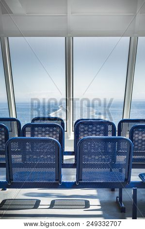 Strait Of Georgia, Bc, Canada - May 27, 2017: Covered Metal Seating And Eastern View Of Sunny Clear 