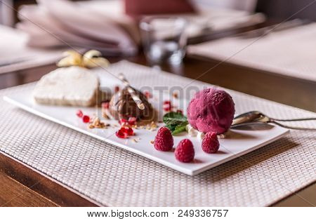 Piece Of Brown Mousse A U Chocolate Sweet Dessert And Decoration On A White Plate Background
