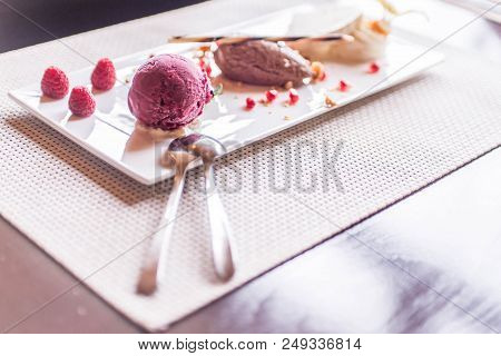 Piece Of Brown Mousse A U Chocolate Sweet Dessert And Decoration On A White Plate Background