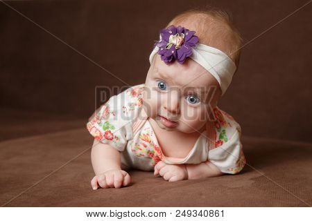 Beautiful Baby Girl Crawling And Rolling Over In Bed
