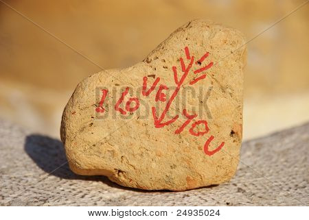 I love you message on a stone