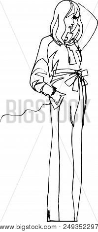 Model Shows Clothes, 1970 Style, Long Flared Trousers To Floor, Belt With Bow, Blouse With Long Cuff