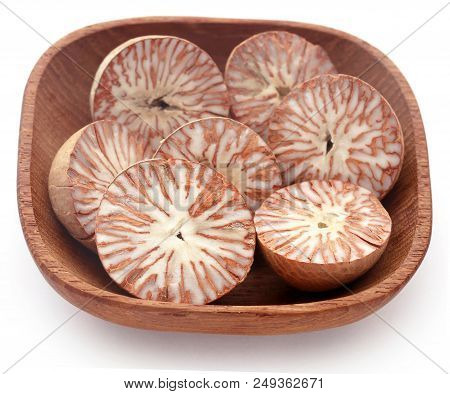 Betel Nuts In A Bowl Over White Background