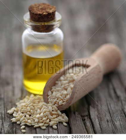 Peeled Sesame Seeds With Oil On Natural Surface