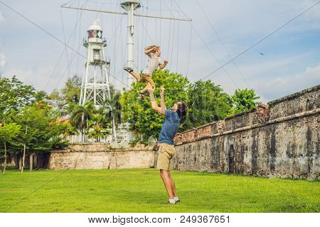 Dad And Son On Background Of Fort Cornwallis In Georgetown, Penang, Is A Star Fort Built By The Brit