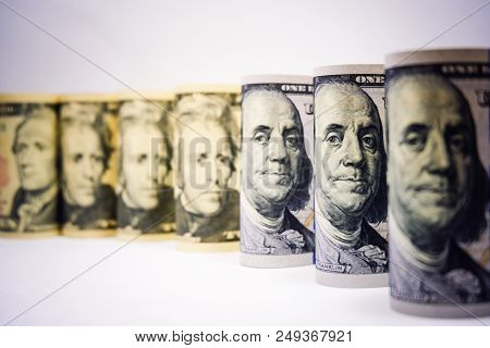Usa America Banknote Roll Against With White Background For Currency Exchange And Investment Concept