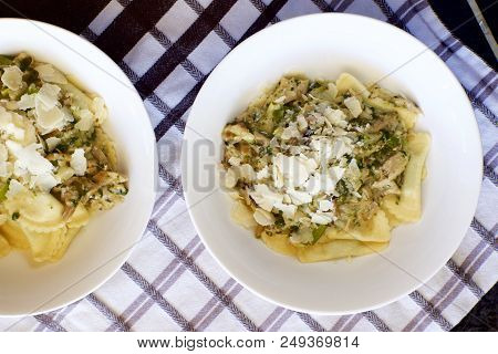Fresh Ricotta And Spinach Agnolotti With Chicken And Vegetable Sauce.
