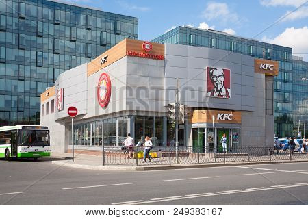 Moscow, Russia - July 13, 2018: Kfc Restaurant Building, People And Bus On Leningradskoye Highway. T