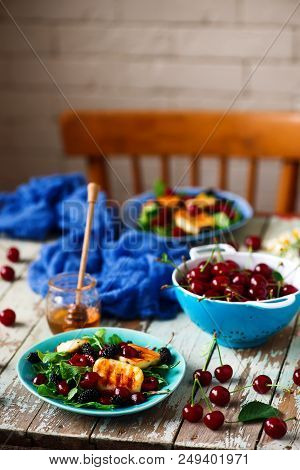 Grilled Halumi  Cheese Salad With Berries.food Gathering.selective Focus