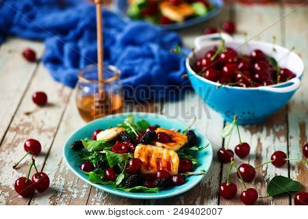 Grilled Halumi  Cheese Salad With Berries.food Gathering.selective Focus
